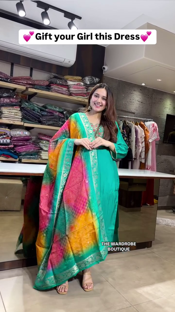 Green Anarkali Kurta Set with Colorful Bandhani-Style Dupatta, Delicate Neck Embroidery, and Flowy Silhouette – A Joyful Ethnic Gift Choice for Festive Celebrations and Special Moments