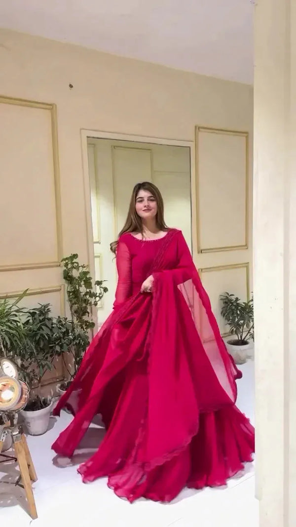 Flowing Red Anarkali Gown with Sheer Dupatta and Delicate Lace Detailing – Perfect for Weddings, Festive Events, and Special Occasions