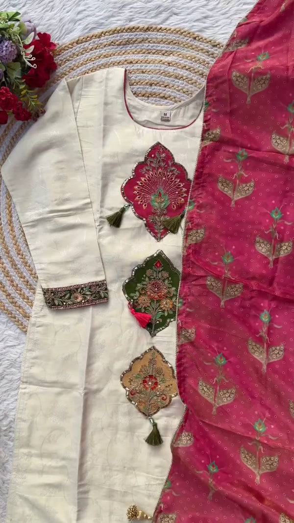 Elegant White Embroidered Unstitched Dress Set with Intricate Floral and Tassel Detailing, Complemented by a Rich Pink Dupatta with Gold Print - Ideal for Festive Occasions